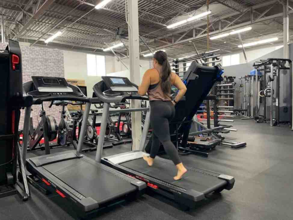 woman-running-barefoot-on-a-treadmill